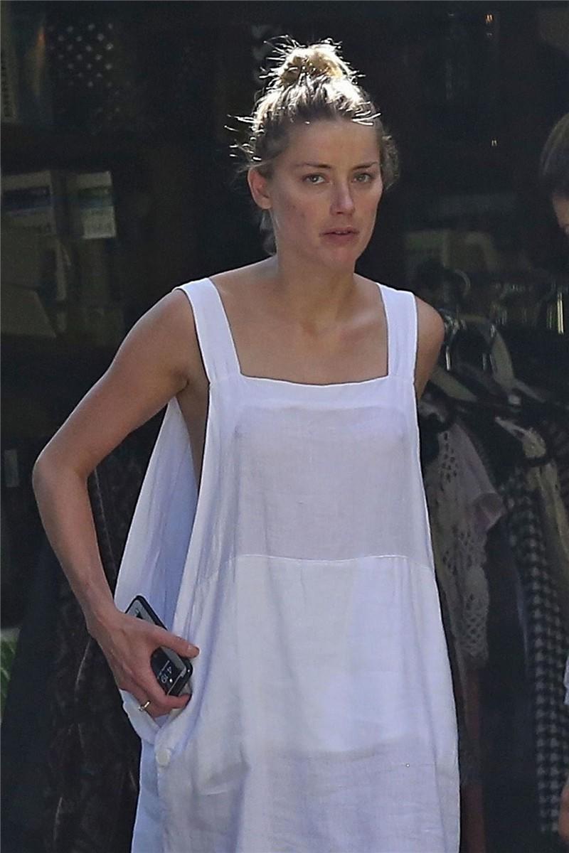 Amber Heard has a nip-slip while cleaning out her garage in LA 07302018  (3).jpg