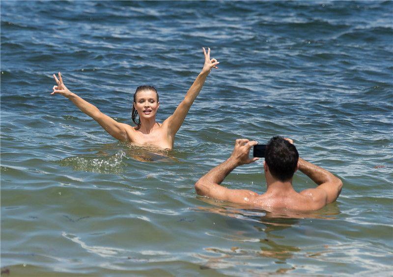 Joanna Krupa - topless, at the beach in Miami - 060815  (9).jpg