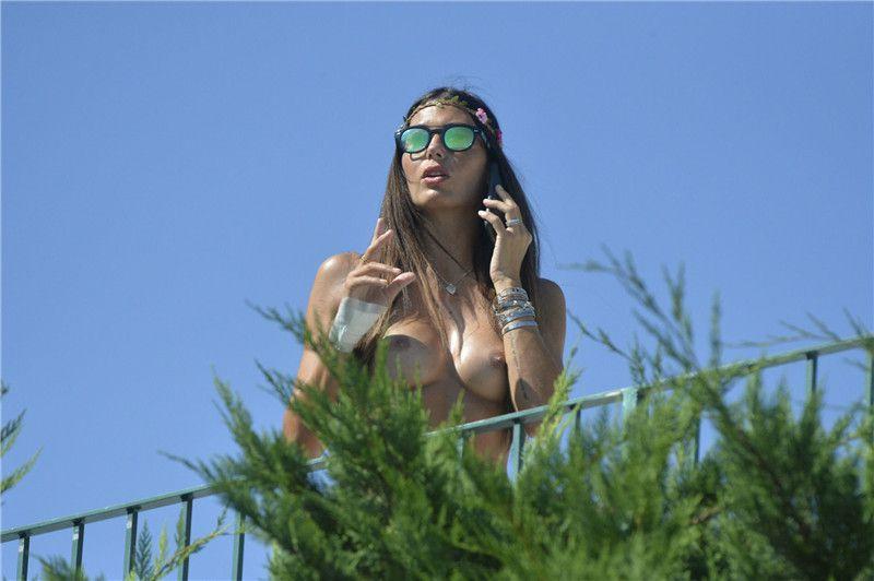 Elisabetta Gregoraci - Topless on a balcony in Porto Cervo 072816   (20).jpg