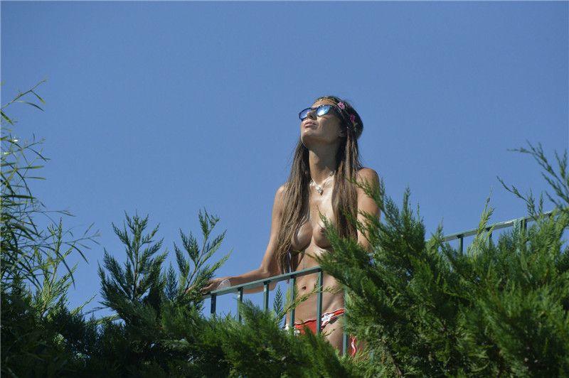 Elisabetta Gregoraci - Topless on a balcony in Porto Cervo 072816   (12).jpg
