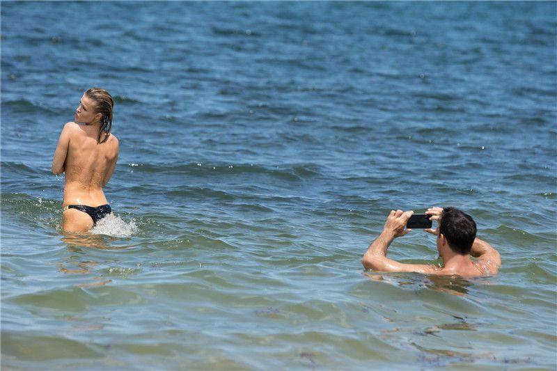 Joanna Krupa - topless, at the beach in Miami - 060815  (7).jpg