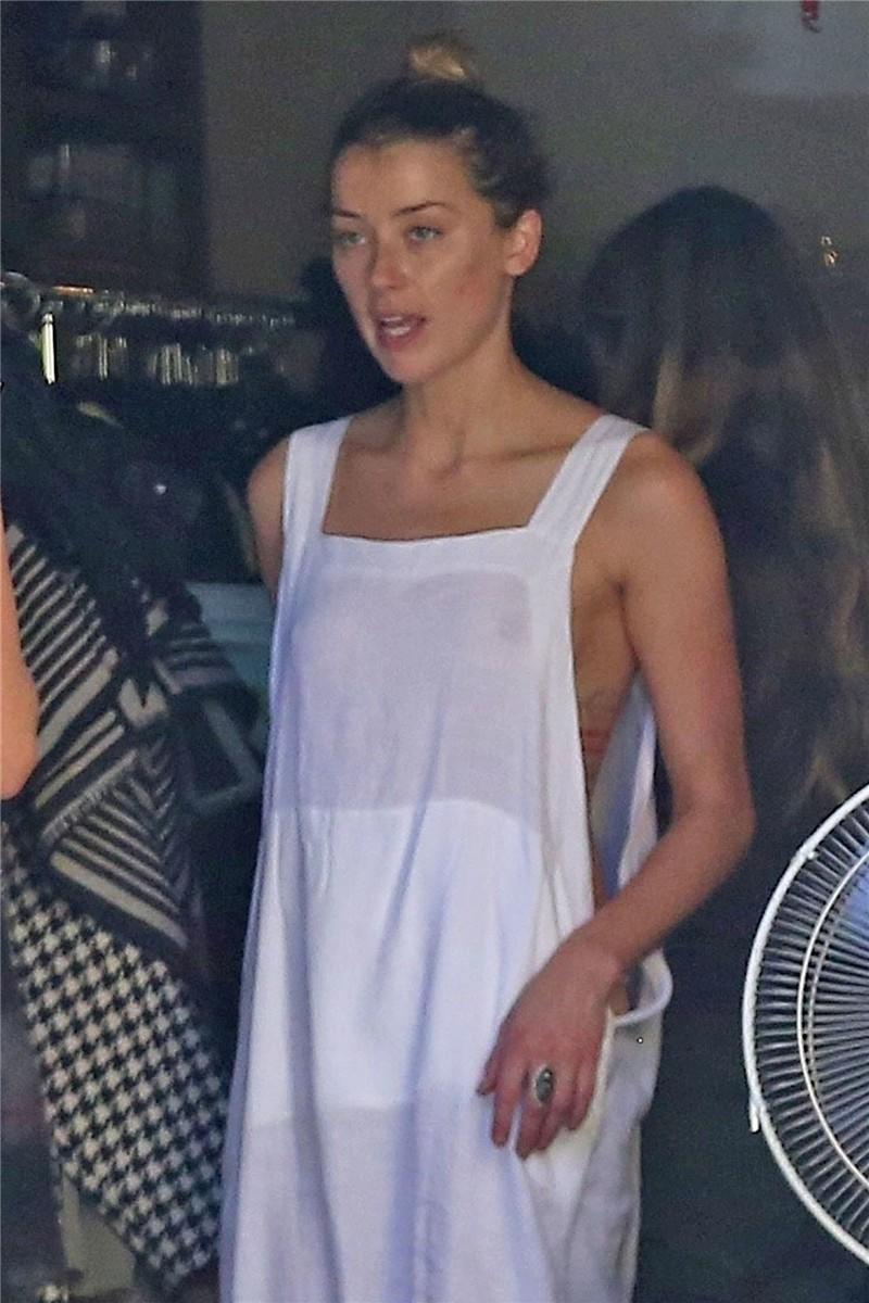 Amber Heard has a nip-slip while cleaning out her garage in LA 07302018  (12).jpg