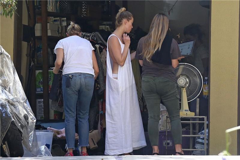 Amber Heard has a nip-slip while cleaning out her garage in LA 07302018  (11).jpg