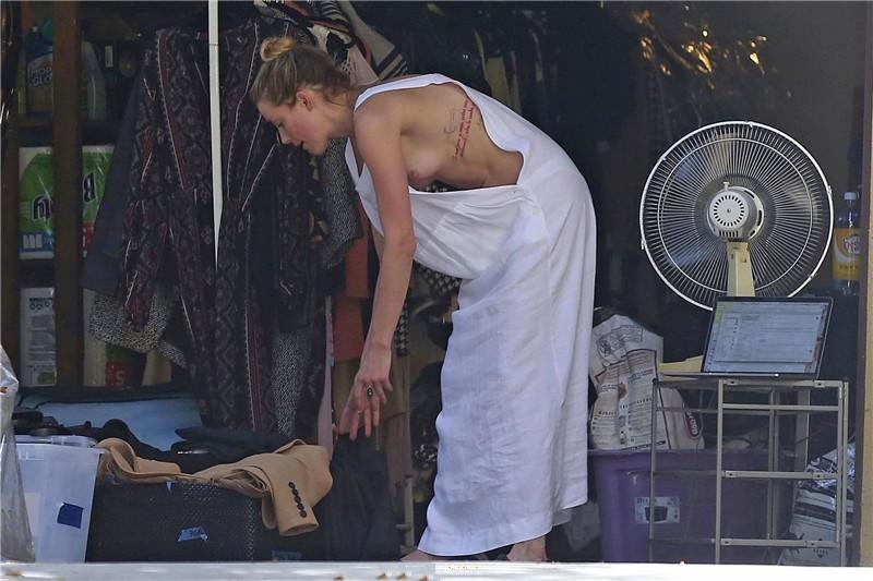 Amber Heard has a nip-slip while cleaning out her garage in LA 07302018  (7).jpg