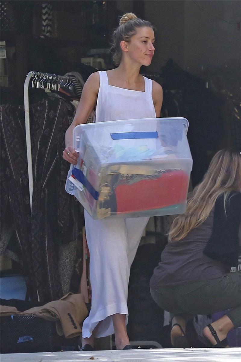 Amber Heard has a nip-slip while cleaning out her garage in LA 07302018  (13).jpg
