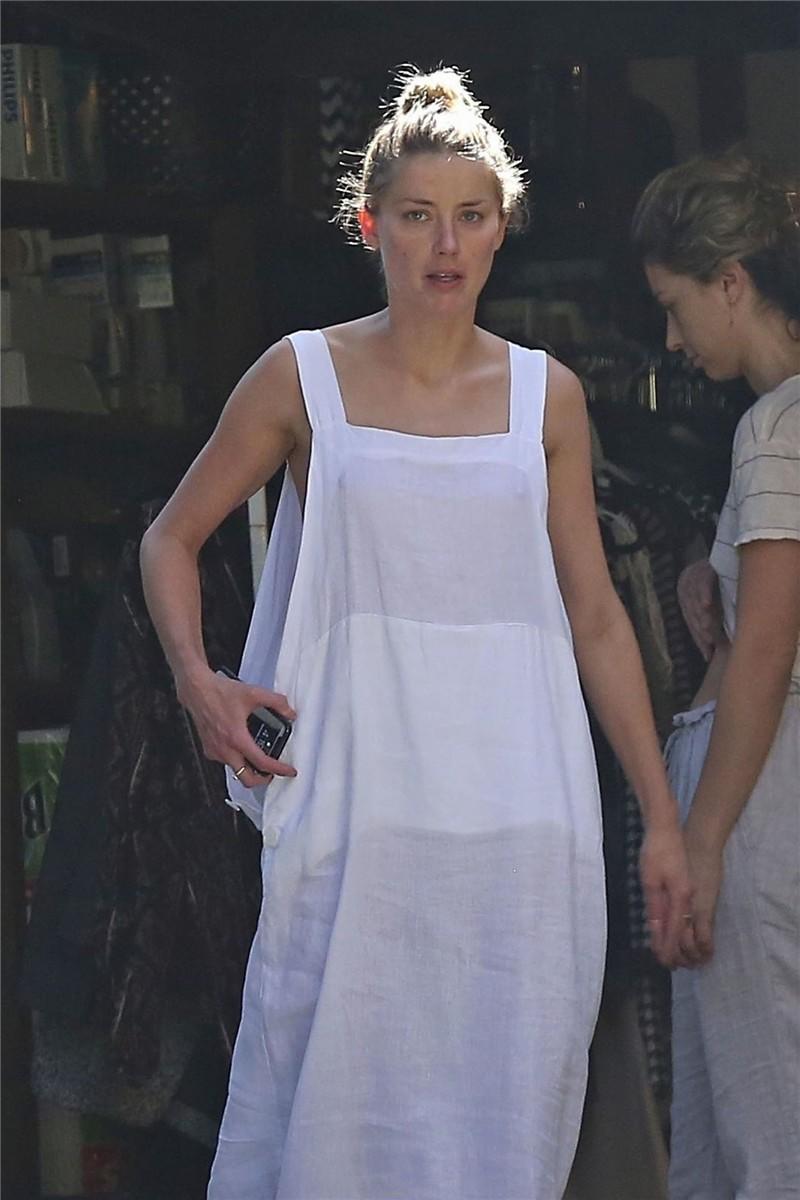 Amber Heard has a nip-slip while cleaning out her garage in LA 07302018  (8).jpg