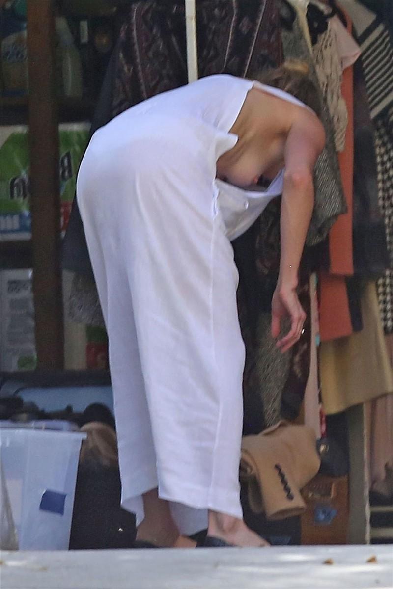 0Amber Heard has a nip-slip while cleaning out her garage in LA 07302018  (4).jpg