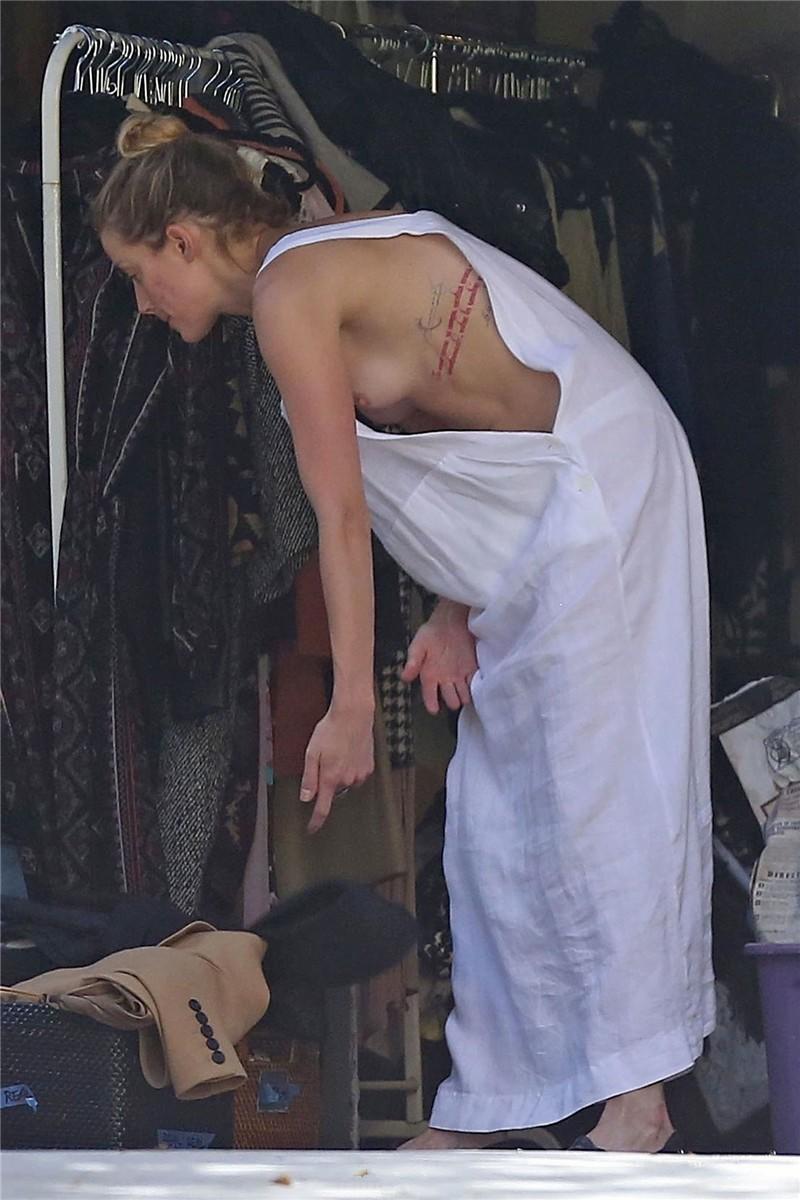 Amber Heard has a nip-slip while cleaning out her garage in LA 07302018  (15).jpg